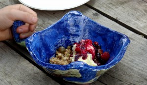 Mouth-watering homemade ice-cream with fresh berries and granola