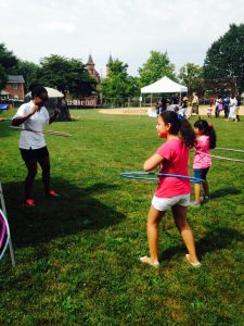 Kids enjoy hula hooping in their final moments of the summer.
